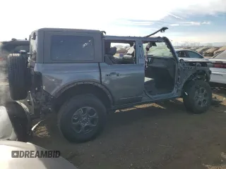 2024 Ford Bronco Big Bend z VIN 1FMDE7BH9RLA85832, wystawiony jako Copart lot #86171994 z przebiegiem 1 196 mil mil oraz Szkoda całkowita • Salvage title. Historia ofert i sprzedaży dostępna na DreamBid. Obrazek 3.