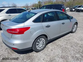 2016 Ford Focus S with VIN 1FADP3E24GL311146, listed as a IAAI auction lot 41983329 with 148,631 mi miles. Bid and sale history available at carsss.com. Image 4.