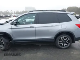 2023 Honda Passport Elite with VIN 5FNYF8H02PB029127, listed as a IAAI auction lot 41166484 with 16,200 mi miles and . Bid and sale history available at DreamBid. Image 14.