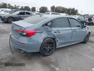 2022 Honda Civic Sport z VIN 2HGFE2F53NH595327, wystawiony jako IAAI lot #41993766 z przebiegiem 26 516 mil mil oraz . Historia ofert i sprzedaży dostępna na DreamBid. Obrazek 4.