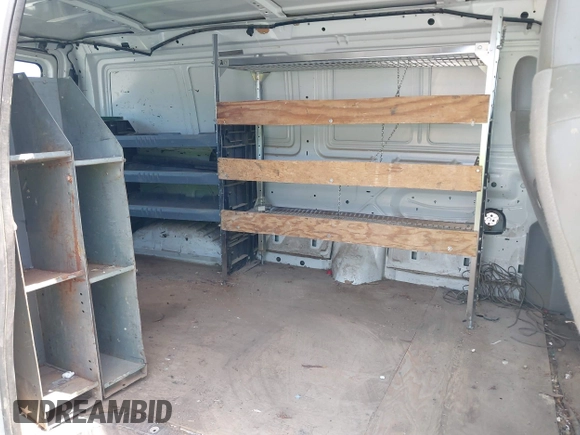 2011 Ford Econoline Cargo Commercial с VIN 1FTNE2EW0BDA09079, выставлен на аукционе IAAI как лот 42527730 с пробегом 104 024 миль миль и . История ставок и продаж доступна на DreamBid. Изображение 8.