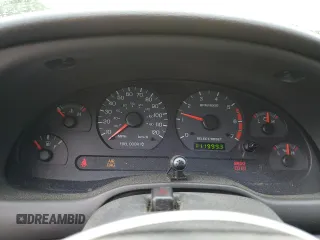 2003 Ford Mustang Deluxe with VIN 1FAFP44433F443082, listed as a Copart auction lot 59916015 with 111,999 mi miles and Salvage title. Bid and sale history available at DreamBid. Image 9.