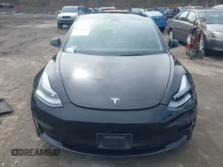 2022 Tesla Model 3 Long Range with VIN 5YJ3E1EBXNF177128, listed as a IAAI auction lot 41966089 with 75,140 mi miles and . Bid and sale history available at DreamBid. Image 12.