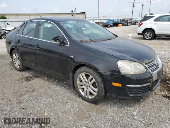 2007 Volkswagen Jetta Wolfsburg Edition z VIN 3VWEF71K77M087560, wystawiony jako Copart lot #60809985 z przebiegiem 151 561 mil mil oraz Szkoda całkowita • Salvage title. Historia ofert i sprzedaży dostępna na DreamBid. Obrazek 4.