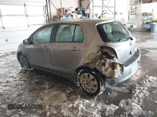 2010 Toyota Yaris with VIN JTDKT4K3XA5290654, listed as a IAAI auction lot 41481563 with 115,012 mi miles. Bid and sale history available at carsss.com. Image 3.