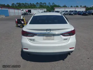 2016 Mazda Mazda6 i Grand Touring with VIN JM1GJ1W55G1443186, listed as a IAAI auction lot 42063716 with 114,263 mi miles. Bid and sale history available at carsss.com. Image 16.