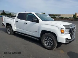 2022 GMC Canyon 4WD AT4 z VIN 1GTG6FEN0N1164841, wystawiony jako Copart lot #54440155 z przebiegiem 31 658 mil mil oraz Szkoda całkowita • Salvage title. Historia ofert i sprzedaży dostępna na DreamBid. Obrazek 4.