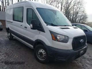 2021 Ford Transit Cargo z VIN 1FTBR2C82MKA29523, wystawiony jako IAAI lot #41069336 z przebiegiem 195 397 mil mil oraz . Historia ofert i sprzedaży dostępna na DreamBid. Obrazek 1.