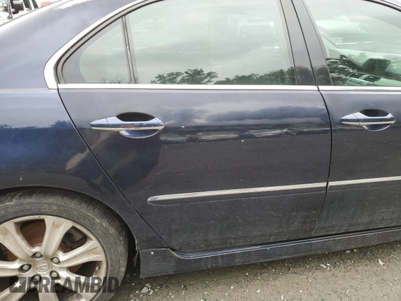 2005 Acura RL z VIN JH4KB16515C014781, wystawiony jako Copart lot #60787895 z przebiegiem Nie podano mil oraz Szkoda całkowita • Salvage title. Historia ofert i sprzedaży dostępna na DreamBid. Obrazek 10.