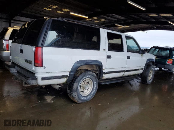 1992 Chevrolet Suburban z VIN 1GNGK26K8NJ330202, wystawiony jako Copart lot #85204074 z przebiegiem 266 388 mil mil oraz Czysty tytuł • Clean title. Historia ofert i sprzedaży dostępna na DreamBid. Obrazek 3.