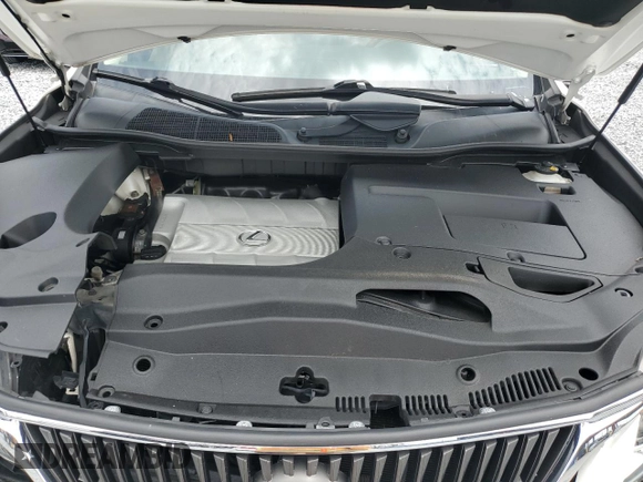 2010 Lexus RX 350 z VIN JTJBK1BA9A2000886, wystawiony jako Copart lot #59733375 z przebiegiem 177 689 mil mil oraz Szkoda całkowita • Salvage title. Historia ofert i sprzedaży dostępna na DreamBid. Obrazek 12.