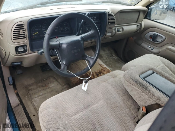 1998 GMC Sierra 1500 with VIN 2GTEC19R8W1522747, listed as a Copart auction lot 80451534 with 180,019 mi miles and Salvage Title. Bid and sale history available at carsss.com. Image 8.