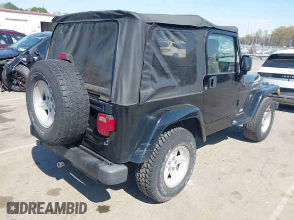 2005 Jeep Wrangler X with VIN 1J4FA39S35P372731, listed as a IAAI auction lot 41875121 with 146,034 mi miles and . Bid and sale history available at DreamBid. Image 4.