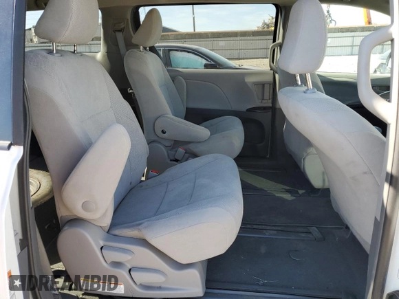 2019 Toyota Sienna L with VIN 5TDZZ3DC6KS995130, listed as a Copart auction lot 77712554 with 71,057 mi miles and Salvage Title. Bid and sale history available at carsss.com. Image 11.