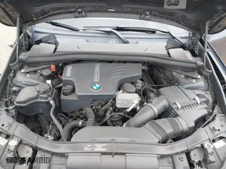 2013 BMW X1 28i with VIN WBAVM1C51DVW42577, listed as a IAAI auction lot 42029627 with 140,343 mi miles. Bid and sale history available at carsss.com. Image 10.