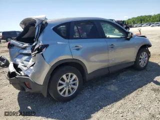 2014 Mazda CX-5 Touring with VIN JM3KE4CY9E0415402, listed as a Copart auction lot 56576114 with 181,719 mi miles and Salvage Title. Bid and sale history available at carsss.com. Image 3.