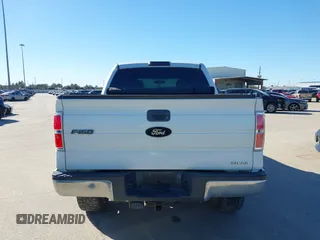 2014 Ford F-150 XL with VIN 1FTFW1EF0EFC74637, listed as a IAAI auction lot 41459594 with 164,970 mi miles. Bid and sale history available at carsss.com. Image 16.