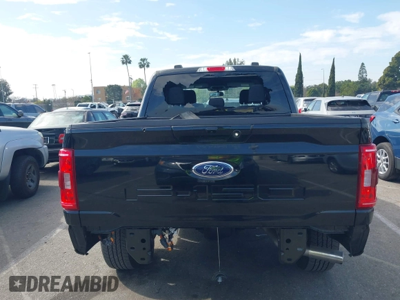 2023 Ford F-150 XL with VIN 1FTFW1ED8PFD08597, listed as a IAAI auction lot 41613094 with 7,266 mi miles and . Bid and sale history available at carsss.com. Image 16.