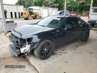 2013 Scion FR-S z VIN JF1ZNAA15D1714041, wystawiony jako Copart lot #59282165 z przebiegiem 124 325 mil mil oraz Szkoda całkowita • Salvage title. Historia ofert i sprzedaży dostępna na DreamBid. Obrazek 1.