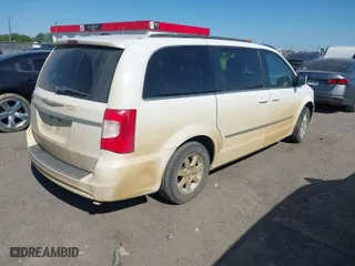 2011 Chrysler Town & Country Touring with VIN 2A4RR5DG0BR719835, listed as a IAAI auction lot 42018522 with 181,678 mi miles. Bid and sale history available at carsss.com. Image 4.