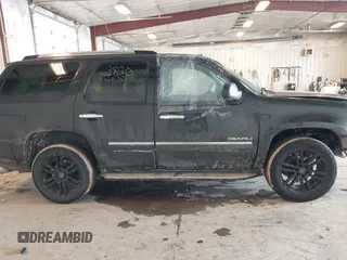 2011 GMC Yukon Denali with VIN 1GKS2EEF2BR258374, listed as a IAAI auction lot 41653820 with 227,468 mi miles. Bid and sale history available at carsss.com. Image 13.