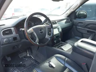 2012 GMC Yukon Denali with VIN 1GKS2EEF8CR320121, listed as a IAAI auction lot 41976562 with 157,050 mi miles. Bid and sale history available at carsss.com. Image 5.