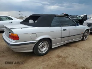 1998 BMW 3 Series 323i with VIN WBABJ8332WEM22760, listed as a Copart auction lot 59631805 with 77,300 mi miles and Salvage title. Bid and sale history available at DreamBid. Image 3.