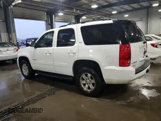 2014 GMC Yukon SLT with VIN 1GKS2CE01ER123696, listed as a Copart auction lot 63401554 with 177,174 mi miles and Salvage Title. Bid and sale history available at carsss.com. Image 2.