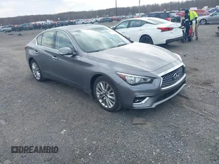 2021 Infiniti Q50 Luxe z VIN JN1EV7BRXMM751698, wystawiony jako IAAI lot #41855240 z przebiegiem 74 517 mil mil oraz . Historia ofert i sprzedaży dostępna na DreamBid. Obrazek 1.