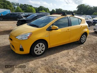 2014 Toyota Prius One z VIN JTDKDTB38E1074953, wystawiony jako Copart lot #59472935 z przebiegiem Nie podano mil oraz Czysty tytuł • Clean title. Historia ofert i sprzedaży dostępna na DreamBid. Obrazek 1.