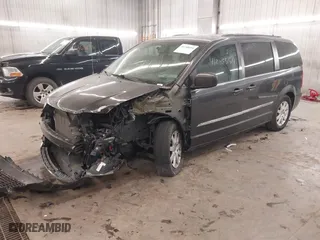 2016 Chrysler Town & Country Touring with VIN 2C4RC1BG5GR229692, listed as a IAAI auction lot 41248554 with 142,155 mi miles. Bid and sale history available at carsss.com. Image 19.