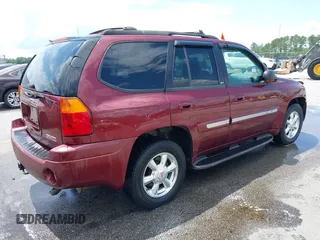 2003 GMC Envoy SLE z VIN 1GKDT13S732389048, wystawiony jako IAAI lot #42414696 z przebiegiem 215 253 mil mil oraz . Historia ofert i sprzedaży dostępna na DreamBid. Obrazek 4.
