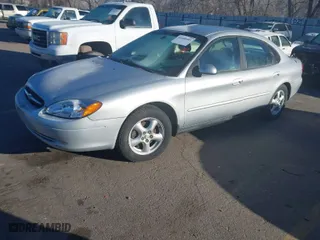 2003 Ford Taurus SE Standard with VIN 1FAFP53U23A245453, listed as a IAAI auction lot 41680402 with 96,761 mi miles. Bid and sale history available at carsss.com. Image 2.