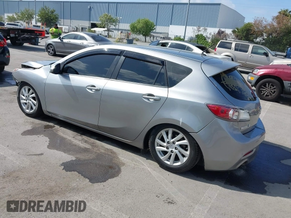 2012 Mazda Mazda3 i Touring with VIN JM1BL1L89C1558242, listed as a IAAI auction lot 42057513 with 112,094 mi miles. Bid and sale history available at carsss.com. Image 3.
