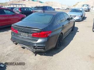 2018 BMW 5 Series M550i xDrive with VIN WBAJB9C55JB286747, listed as a IAAI auction lot 42583106 with 141,102 mi miles and . Bid and sale history available at DreamBid. Image 4.