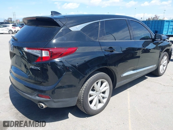 2021 Acura RDX with VIN 5J8TC1H33ML006504, listed as a IAAI auction lot 41933576 with 77,045 mi miles. Bid and sale history available at carsss.com. Image 4.