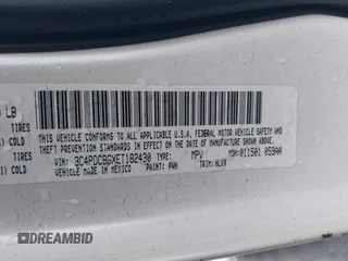 2014 Dodge Journey SXT with VIN 3C4PDCBGXET182430, listed as a IAAI auction lot 41599489 with 143,889 mi miles. Bid and sale history available at carsss.com. Image 9.