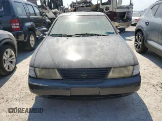 1997 Nissan Sentra XE z VIN 3N1AB41D3VL035555, wystawiony jako Copart lot #76200984 z przebiegiem 166 012 mil mil oraz Szkoda całkowita • Salvage title. Historia ofert i sprzedaży dostępna na DreamBid. Obrazek 5.