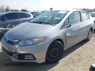 2012 Honda Insight LX с VIN JHMZE2H56CS001570, выставлен на аукционе IAAI как лот 41461236 с пробегом 129 431 миль миль и . История ставок и продаж доступна на DreamBid. Изображение 2.