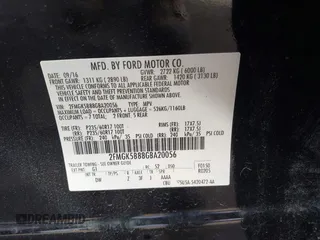2016 Ford Flex SE with VIN 2FMGK5B88GBA20056, listed as a IAAI auction lot 41308982 with 99,202 mi miles. Bid and sale history available at carsss.com. Image 9.