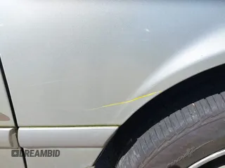 2000 Toyota Camry CE z VIN JT2BG22K6Y0451632, wystawiony jako IAAI lot #42030842 z przebiegiem 200 734 mil mil oraz . Historia ofert i sprzedaży dostępna na DreamBid. Obrazek 16.
