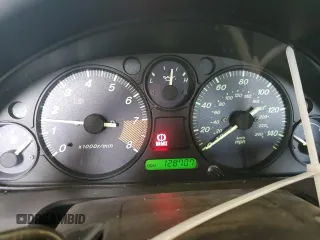 1999 Mazda MX-5 Miata z VIN JM1NB353XX0111850, wystawiony jako Copart lot #53076805 z przebiegiem 128 707 mil mil oraz Szkoda całkowita • Salvage title. Historia ofert i sprzedaży dostępna na DreamBid. Obrazek 9.