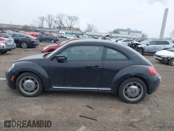 2012 Volkswagen Beetle 2.5L PZEV with VIN 3VWJP7AT0CM628169, listed as a IAAI auction lot 41628754 with 64,770 mi miles and . Bid and sale history available at DreamBid. Image 14.