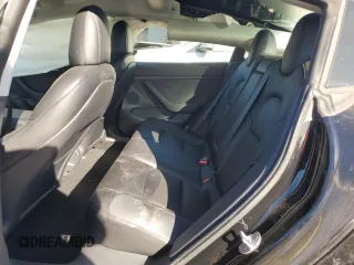 2021 Tesla Model 3 Standard Range Plus with VIN 5YJ3E1EA3MF996701, listed as a Copart auction lot 47013195 with 34,177 mi miles and Salvage Title. Bid and sale history available at carsss.com. Image 10.