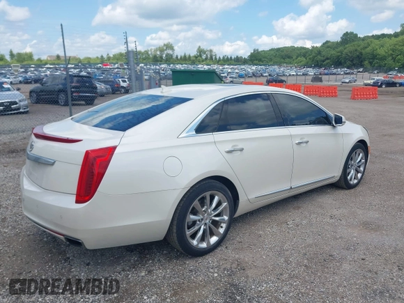 2013 Cadillac XTS Luxury with VIN 2G61P5S34D9138319, listed as a IAAI auction lot 42626756 with 88,743 mi miles and . Bid and sale history available at DreamBid. Image 4.