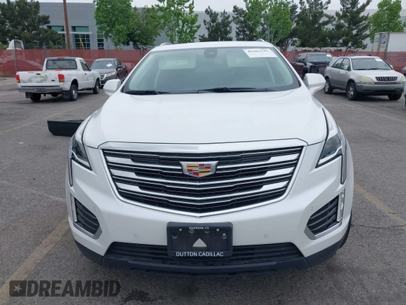2017 Cadillac XT5 Premium Luxury FWD z VIN 1GYKNCRS3HZ307728, wystawiony jako IAAI lot #42203542 z przebiegiem 50 433 mil mil oraz . Historia ofert i sprzedaży dostępna na DreamBid. Obrazek 13.