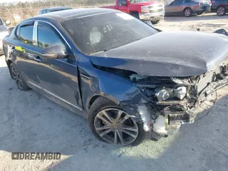 2015 Kia Optima EX with VIN 5XXGN4A71FG426726, listed as a IAAI auction lot 41341272 with 114,298 mi miles. Bid and sale history available at carsss.com. Image 1.