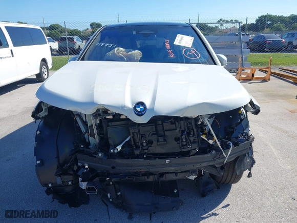 2025 BMW iX xDrive50 with VIN WB523CF02SCT10334, listed as a IAAI auction lot 40396663 with 971 mi miles. Bid and sale history available at carsss.com. Image 6.