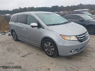 2016 Honda Odyssey Touring Elite with VIN 5FNRL5H90GB097310, listed as a IAAI auction lot 41545601 with 160,198 mi miles. Bid and sale history available at carsss.com. Image 1.