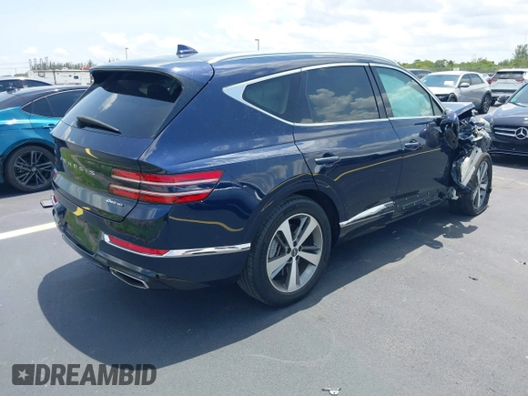 2023 Genesis GV80 with VIN KMUHCESC1PU128519, listed as a IAAI auction lot 42384545 with 32,388 mi miles and . Bid and sale history available at DreamBid. Image 4.